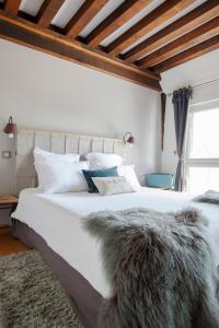Maisons d'hôtes - Domaine Le Coq Enchanté客房内的一张或多张床位
