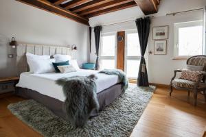 Maisons d'hôtes - Domaine Le Coq Enchanté客房内的一张或多张床位