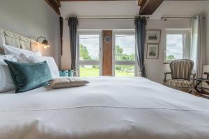 Maisons d'hôtes - Domaine Le Coq Enchanté客房内的一张或多张床位