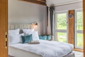 Maisons d'hôtes - Domaine Le Coq Enchanté客房内的一张或多张床位