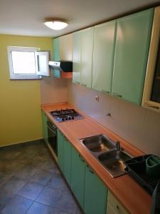 Kuchyň nebo kuchyňský kout v ubytování Robinson's house