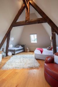 Maisons d'hôtes - Domaine Le Coq Enchanté客房内的一张或多张床位