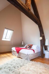 Maisons d'hôtes - Domaine Le Coq Enchanté客房内的一张或多张床位