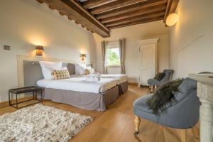 Maisons d'hôtes - Domaine Le Coq Enchanté客房内的一张或多张床位