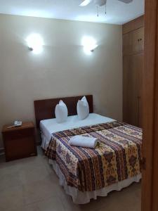 Katil atau katil-katil dalam bilik di Hotel Quinta Loriffe