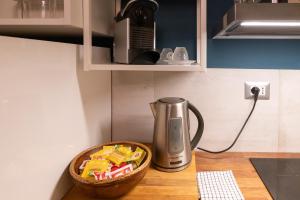 A kitchen or kitchenette at Rione Monti Studio Apt with private garden