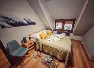 Ένα ή περισσότερα κρεβάτια σε δωμάτιο στο Stolarnia