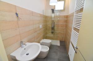 Ванная комната в Boomerang Residence a Torre Colimena