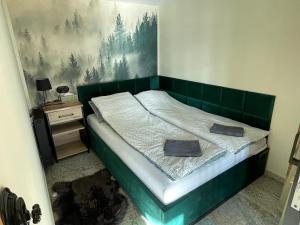 Posteľ alebo postele v izbe v ubytovaní Pod Koroną 5 + 11 fotografií