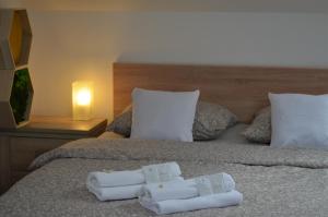 מיטה או מיטות בחדר ב-Pension Vyhlídka