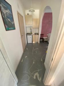 Kuchyň nebo kuchyňský kout v ubytování Macloud pub B&B