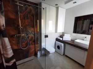 Kúpeľňa v ubytovaní M&K Apartamenty Rodzinny, Gdańsk - Wyspa Sobieszewska + 18 fotografií