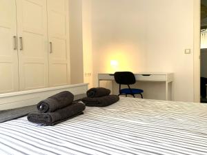 Postel nebo postele na pokoji v ubytování 2 Apartamento TERRAZA Free Wifi