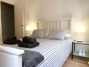Postel nebo postele na pokoji v ubytování 2 Apartamento TERRAZA Free Wifi