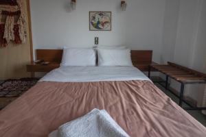 Postel nebo postele na pokoji v ubytování ARION