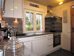 Kuchyň nebo kuchyňský kout v ubytování Casita - Sterneferienhaus mit Garten, Sauna und Wallbox