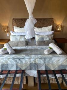 Cama o camas de una habitación en Luna rossa 19 Zebula golf course and spa resort