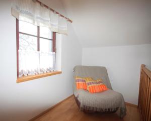Posteľ alebo postele v izbe v ubytovaní Apartmán V sadu