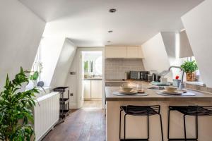 A kitchen or kitchenette at East Street Apartments, The Lanes Brighton