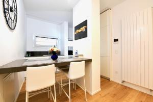 Foto Luganos asuva majutusasutuse Lake Modern Suites - Free Parking galeriist