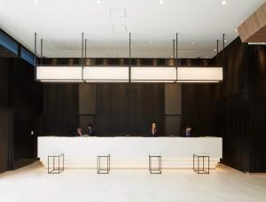 a lobby with people sitting at a reception desk at Tmark City Hotel Tokyo Omori - Vacation STAY 26391v in Tokyo