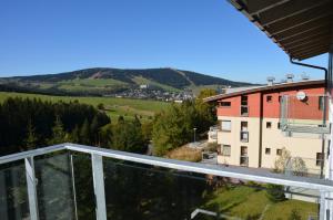 Nespecifikovaný výhled na hory nebo výhled na hory při pohledu z apartmánu