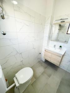 Kúpeľňa v ubytovaní Spacious Apartment Amaros + 30 fotografií