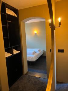 Postel nebo postele na pokoji v ubytování Hotel Oostereiland