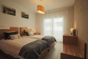 Katil atau katil-katil dalam bilik di Casa dos 4 Caminhos - Guest House Douro
