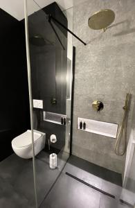 Kúpeľňa v ubytovaní Apartament Złote Noce