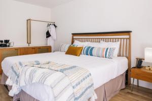 Postel nebo postele na pokoji v ubytování L3 Oasis Hotel