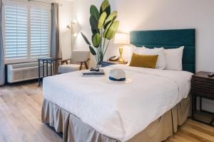 Postel nebo postele na pokoji v ubytování L3 Oasis Hotel
