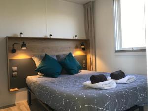 Katil atau katil-katil dalam bilik di Le Lodge Premium