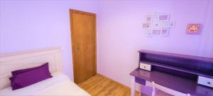 Posteľ alebo postele v izbe v ubytovaní Lovely Centric Apartment