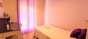 Posteľ alebo postele v izbe v ubytovaní Lovely Centric Apartment