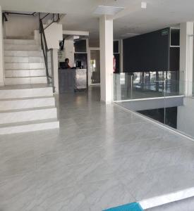 TV a/nebo společenská místnost v ubytování Hotel Estadía + 23 fotografií