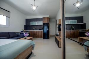 Ein Bett oder Betten in einem Zimmer der Unterkunft Studio Athena with panoramic view of MakryGialos