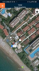 a map of a resort next to the water at Summer House by the Sea - 40 m to the beach in Side