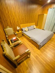 Voodi või voodid majutusasutuse Indus View Hotel Skardu toas