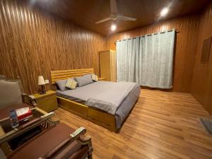 Voodi või voodid majutusasutuse Indus View Hotel Skardu toas