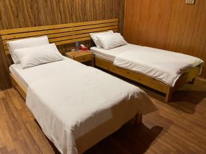 Voodi või voodid majutusasutuse Indus View Hotel Skardu toas