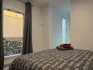 Posteľ alebo postele v izbe v ubytovaní Relaxing 1Bedroom Apartment in the Heart of Malaga - WIFI&AC