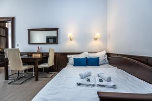 Postel nebo postele na pokoji v ubytování Apartrezidence Opletalova