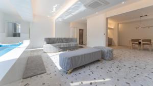 Posezení v ubytování Denbasta forest Hotel