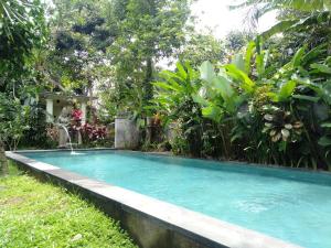 Bassein majutusasutuses Manggis Sari Guesthouse või selle lähedal