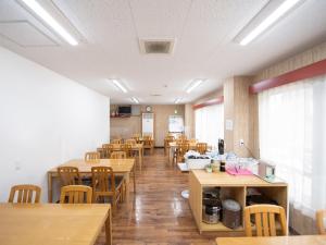 Restoran või mõni muu söögikoht majutusasutuses Tabist Hamatoya Ryokan Mens Only