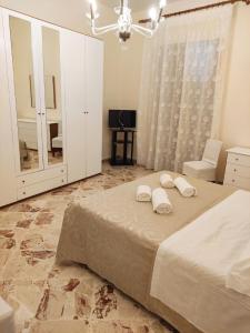 Posteľ alebo postele v izbe v ubytovaní Casa Mia, vacanze
