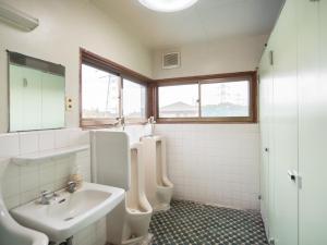 Vannituba majutusasutuses Tabist Hamatoya Ryokan Mens Only