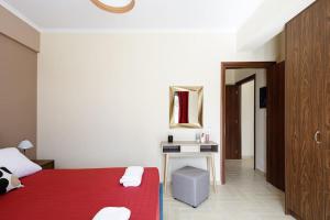 Postel nebo postele na pokoji v ubytování Galini House