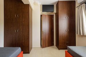 Postel nebo postele na pokoji v ubytování Galini House
